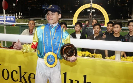 Ellis Wong celebrates graduating from his apprenticeship at Happy Valley. Photos: Kenneth Chan