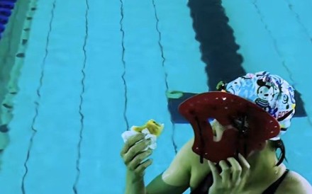 Chinese swimmer Li Bingjie shared a 2020 photograph of her eating a cold steamed bun at a training facility 2,400m above sea level during a CCTV interview released on Sunday. Photo: CCTV