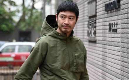 Actor Gregory Wong enters West Kowloon Court on February 1, 2024. Photo: AFP