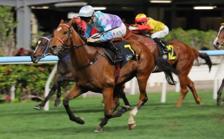 Solid Win, ridden by Dylan Browne McMonagle, triumphs at Happy Valley. Photos: Kenneth Chan.