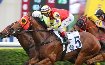 Crimson Flash, ridden by Andrea Atzeni, wins at Sha Tin. Photos: Kenneth Chan.