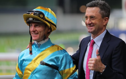 Zac Purton (left) and Douglas Whyte (right) celebrate the win of Giant Ballon at Happy Valley. Photos: Kenneth Chan