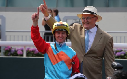 Jockey Zac Purton and trainer David Hayes celebrate Ka Ying Rising’s latest victory. Photos: Kenneth Chan