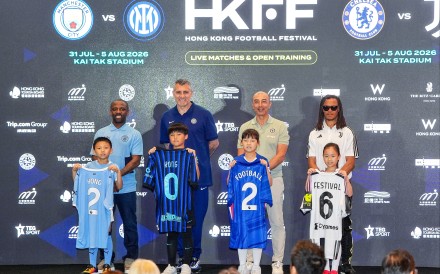 Shaun Wright-Phillips, Christian Vieri, Roberto Di Matteo and Edgar Davids (back row left to right) pose for pictures with little fans on stage during the press conference of Hong Kong Football Festival, on April 21, to be held in coming summer. Photo: Elson Li