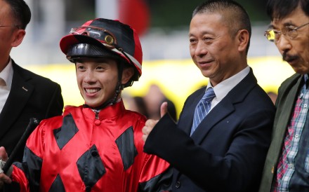 Jockey Angus Chung and trainer Danny Shum celebrate General Redwood’s Happy Valley win. Photos: Kenneth Chan