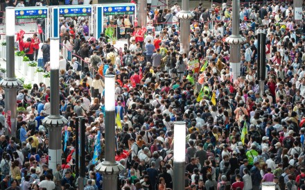 Crowds pack the West Kowloon rail terminus on the first day of the Easter break in April. Photo: Jelly Tse
