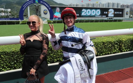 Zac Purton and wife Nicole celebrate his 1,998th Hong Kong winner. Photos: Kenneth Chan