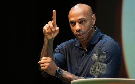 Former France and Arsenal forward Thierry Henry speaking to about 600 pupils at the Hong Kong Jockey Club Amphitheatre on Tuesday. Photo: Sun Yeung