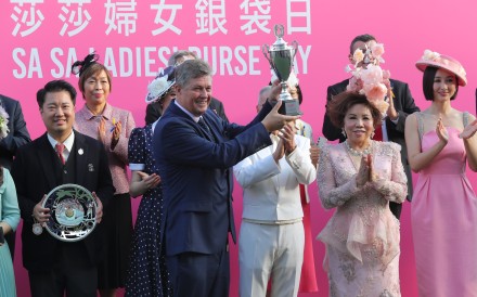 Brett Crawford with the Sa Sa Ladies’ Purse trophy after his win with Encountered last November. Photos: Kenneth Chan