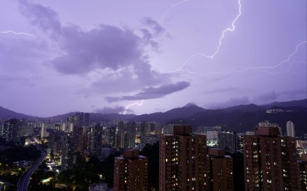 Lightning illuminates the night sky above Sha Tin on June 8. The Hong Kong Observatory issued the first black rainstorm warning of the year for an hour on June 8. Photo: Sam Tsang