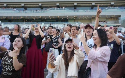 Racing fans cheer on  their favourites at Sha Tin during the penultimate meet of the Hong Kong season. Photo: Sam Tsang
