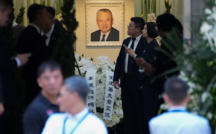 A portrait of Tung Chee-hwa is displayed in the funeral hall. Photo: Kit Lai
