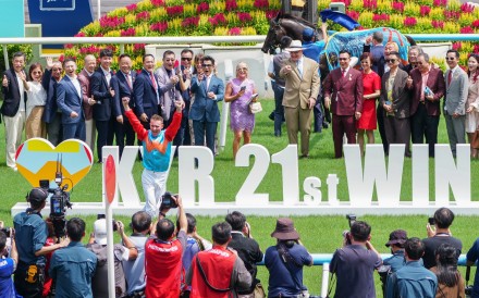 Jockey Zac Purton celebrates Ka Ying Rising’s 21st straight win. Photo: Sam Tsang