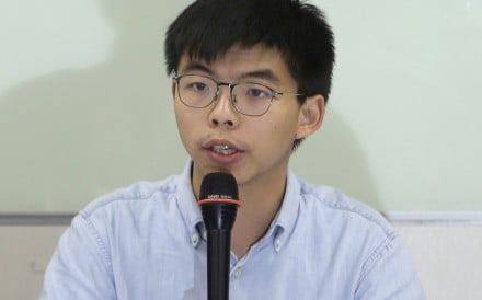 Joshua Wong addresses a press conference in Taiwan. Photo: AP