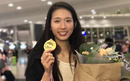 Fencer Vivian Kong Man-wai shows off the gold medal she won at a World Cup event in Havana, Cuba in 2019. Photo: Chan Kin-wa