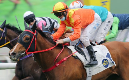 Flagship Glory hits the line to salute under Zac Purton at Sha Tin on Sunday. Photos: Kenneth Chan