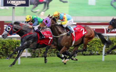 Reliable Team (left) holds out Ka Ying Star to win the Jockey Club Cup. Photo: Kenneth Chan