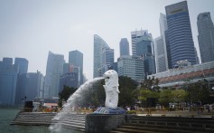 A view of Singapore’s central business district and Merlion statue from Marina Bay. A 10-day campaign period ahead of next week’s presidential election got under way in the city state on Tuesday with the acceptance of three men’s candidacies. Photo: AP