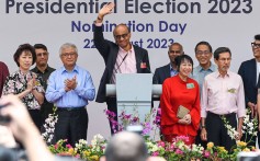 Presidential candidate Tharman Shanmugaratnam waves after a speech at the nomination centre for the presidential election in Singapore on August 22. Photo: AFP
