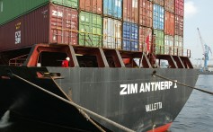 A cargo vessel owned by Israeli shipping firm Zim docked at the port of Hamburg, Germany. File photo: AP