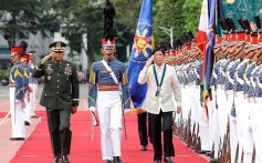 Philippines President Ferdinand Marcos Jnr (right) inspects troops during the 88th anniversary of the Armed Forces of the Philippines at Camp Aguinaldo in Quezon city. Photo: PCO/AFP