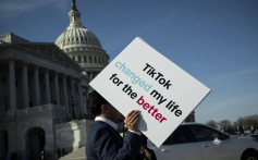 A TikTok advocate rallies outside the US Capitol in Washington on March 12. Photo: Bloomberg