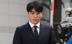 Seungri arrives for questioning over criminal allegations at the Seoul Metropolitan Police Agency on March 14. The South Korean pop star has announced his retirement from show business amid mounting criminal investigations. Photo: AFP