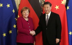 Xi Jinping and Angela Merkel at the Paris meeting. Photo: EPA-EFE