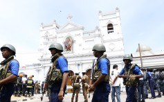 Security staff stand guard outside St. Anthony's Church where a blast took place in Colombo, Sri Lanka. Photo: Xinhua