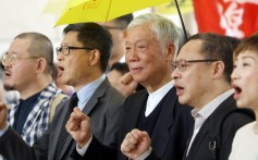 (From left) Lawmaker Shiu Ka-chun, co-founders of the Occupy movement Chan Kin-man, Chu Yiu-ming and Benny Tai Yiu-ting, and lawmaker Tanya Chan chant slogans outside the West Kowloon Court in Sham Shui Po, where they were tried for their participation in the Occupy protests, on April 10. Photo: Sam Tsang