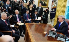 China’s Vice-Commerce Minister Wang Shouwen (seated, far right) is part of China’s trade negotiations with the United States. Photo: Xinhua