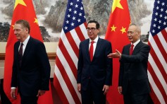 Chinese Vice Premier Liu He shows the way to US Treasury Secretary Steven Mnuchin and US Trade Representative Robert Lighthizer as they proceed to their meeting at the Diaoyutai State Guesthouse in Beijing on May 1, 2019. Photo: AFP