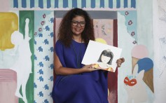 Assia Bennani with her children’s book about Hong Kong. Photo: Jonathan Wong