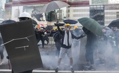 Tear gas is used on anti-government protesters after they occupy Harcourt Road in Admiralty during another day of unrest on Monday. Photo: Sam Tsang