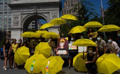 Attendees at a New York protest in Washington Square Park show their support for protests in Hong Kong. Photo: Joy Chang