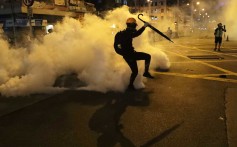 Protesters and police clashed outside Sham Shui Po police station after a university student union president was arrested for carrying laser pointers. Photo: Edmond So