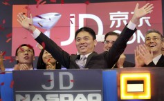 Richard Liu, CEO of JD.com, celebrates the company’s initial public offering in May 2014. China’s encouragement of private entrepreneurship has allowed e-commerce companies such as JD.com, Alibaba and Tencent to swiftly establish themselves as global leaders in innovation. Photo: AP