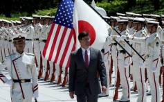 US Secretary of Defence Mark Esper inspects an honour guard ahead in Tokyo, Japan. Photo: Reuters