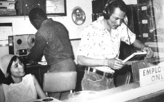 VP Records’ Patricia Chin and Vincent “Randy” Chin (right) in Randy’s Records in Jamaica (1958).