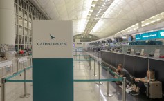 A deserted Cathay Pacific Airways check-in area, after all flights were cancelled over protests at Hong Kong International Airport against alleged police brutality and the now-shelved extradition bill, on August 12. A fifth of Cathay’s flights are directed at the China market, comprising 24 destinations on the mainland. Photo: AFP