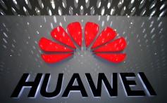 FILE PHOTO: A Huawei company logo is pictured at the Shenzhen International Airport in Shenzhen, Guangdong province, China July 22, 2019. REUTERS/Aly Song/File Photo