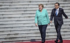 German Chancellor Angela Merkel and Chinese Premier Li Keqiang at the Great Hall of the People in Beijing on Friday. Photo: AP