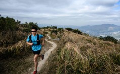 Runner Stone Tsang, 39,running on Hong Kong’s highest peak, Tai Mo Shan, which forms part of the 100km MacLehose Trail. Picture: AFP