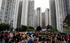 Protesters march in Tseung Kwan O, a residential district in Hong Kong, on August 4. Photo: Reuters