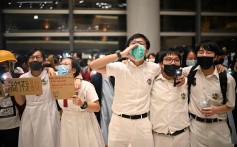 Students gather at a shopping mall in Lok Fu on September 23 to sing “Glory to Hong Kong”, which has become the anthem of the pro-democracy protests. Photo: AFP