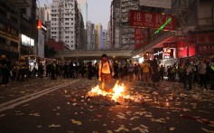 Anti-government protesters set a fire in Causeway Bay, Hong Kong. Photo: Winson Wong