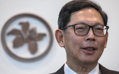 Retiring Hong Kong Monetary Authority chief executive Norman Chan Tak-lam meets the press at Two International Finance Centre (IFC) in Central. Photo: SCMP