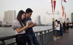 Chinese investors see Southeast Asians as ‘comfortable’ with mobile technologies. Photo: Bloomberg