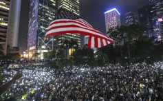 Anti-government protesters wave the US flag during a protest at Chater Garden in Central. Photo: Felix Wong