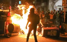 Protesters throw petrol bombs and set fires during scuffles with police in Hong Kong on September 29. There are those who profess sympathy and support for lawbreaking protesters, emboldening them. Photo: K.Y. Cheng